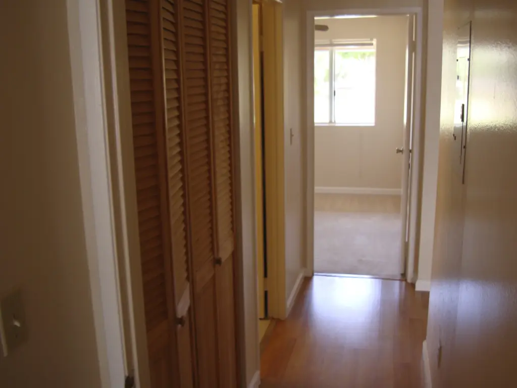 Hallway closet and front Bedroom